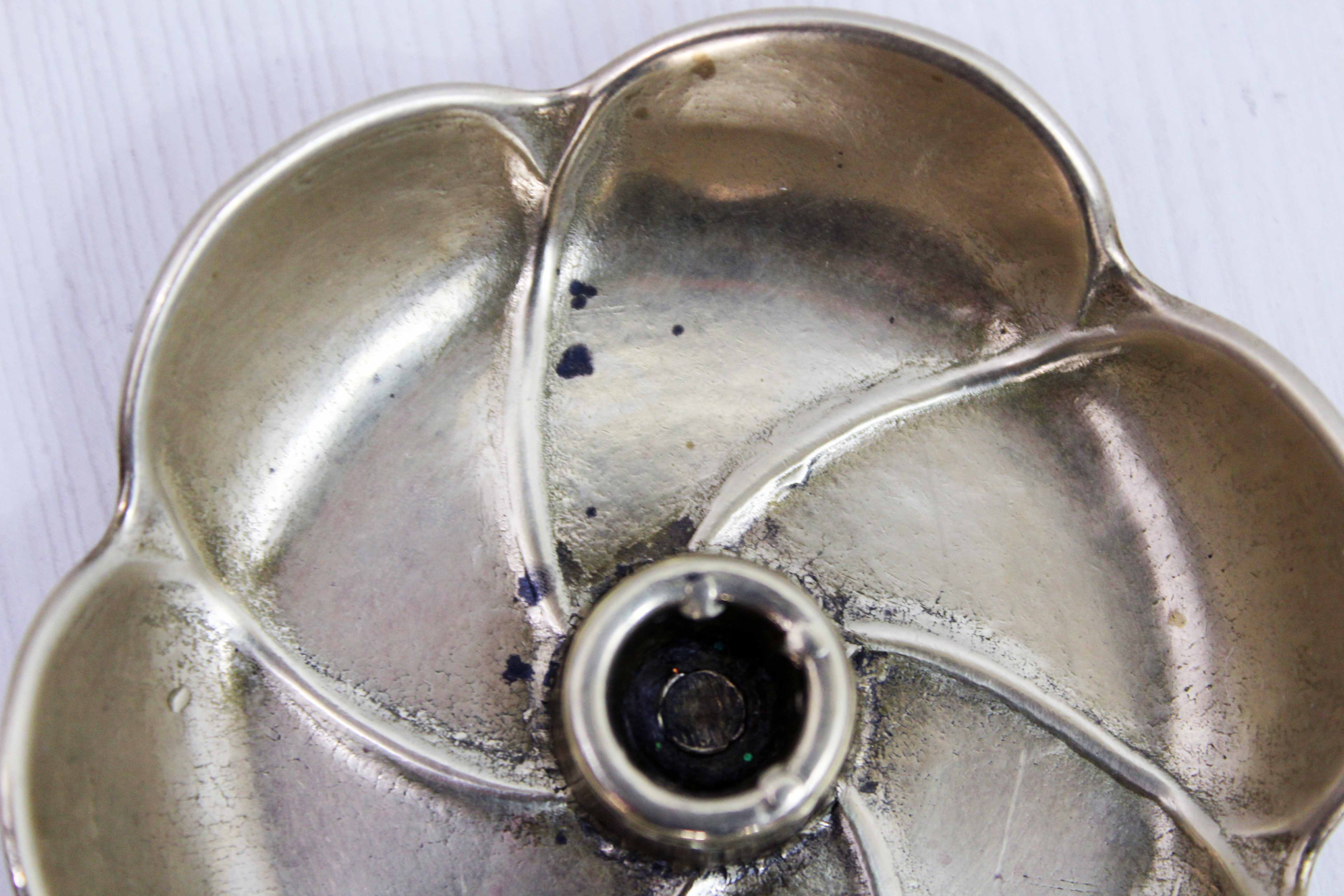 Brass flower candle holder