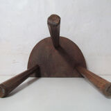 Old half-moon wooden tripod stool