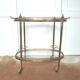 Desserte golden bar brass and glass
