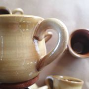 Set of 7 vintage stoneware yellow coffee cups