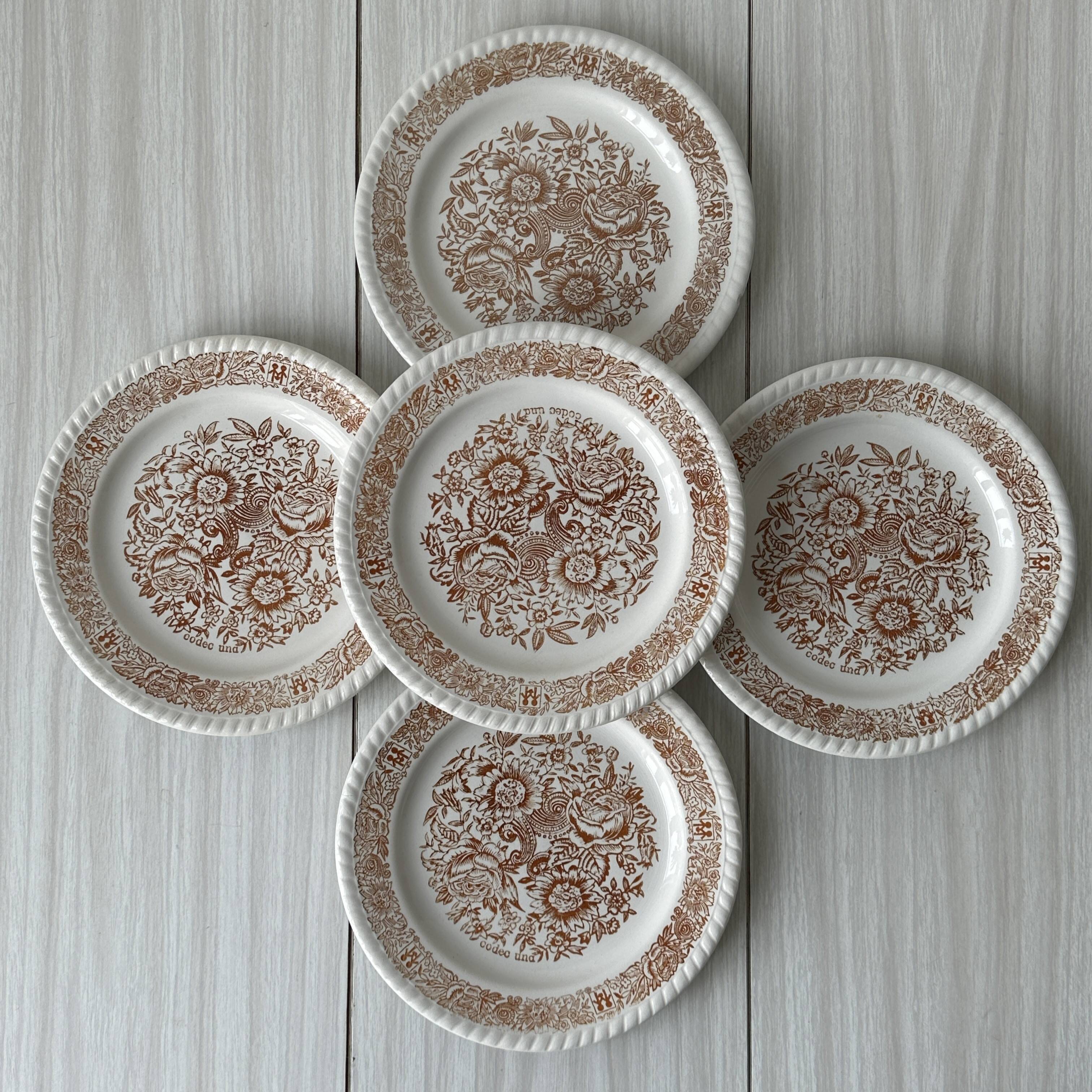 5 orange dessert plates.