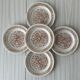 5 orange dessert plates.