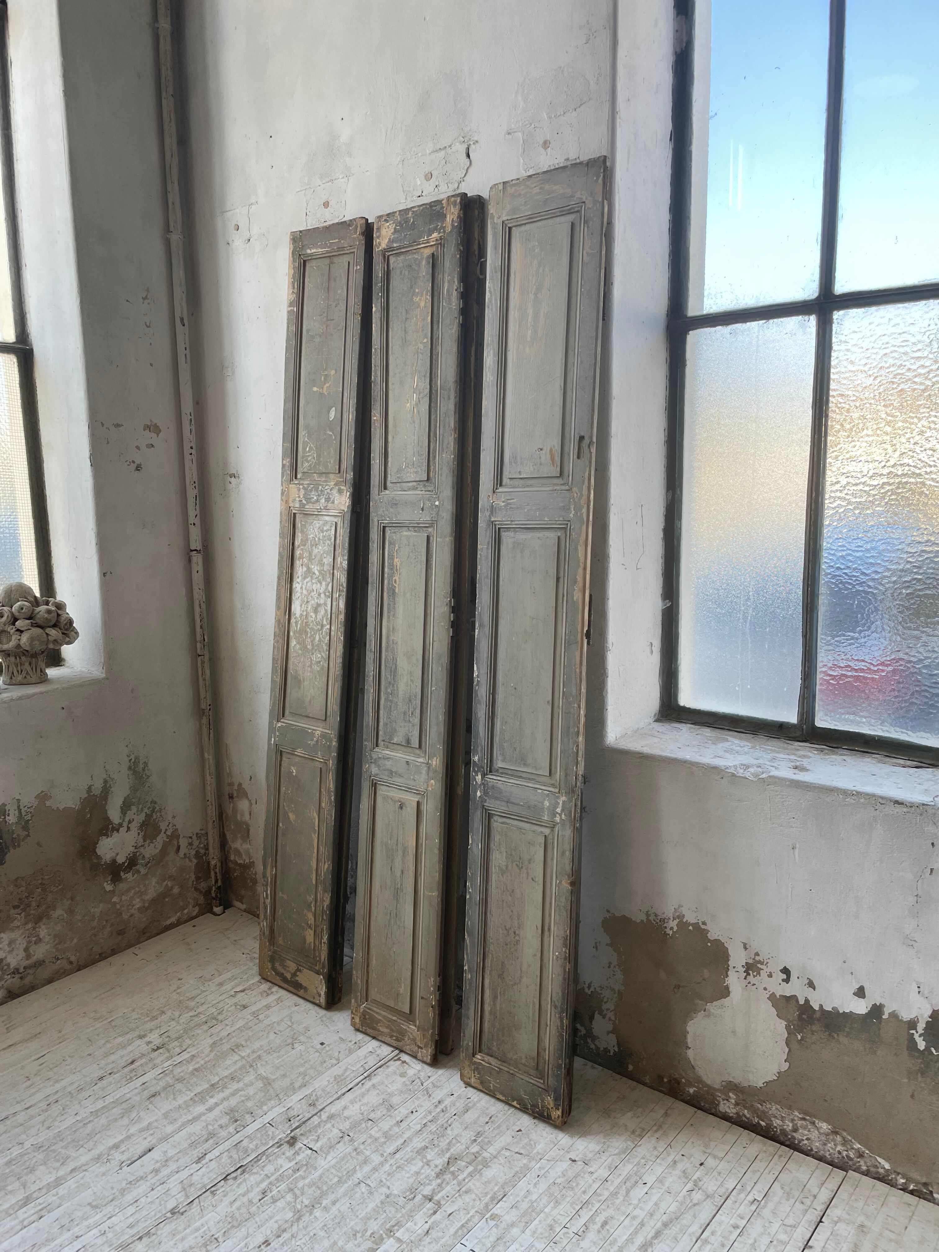 Trio of shutters louvers patina blue gray