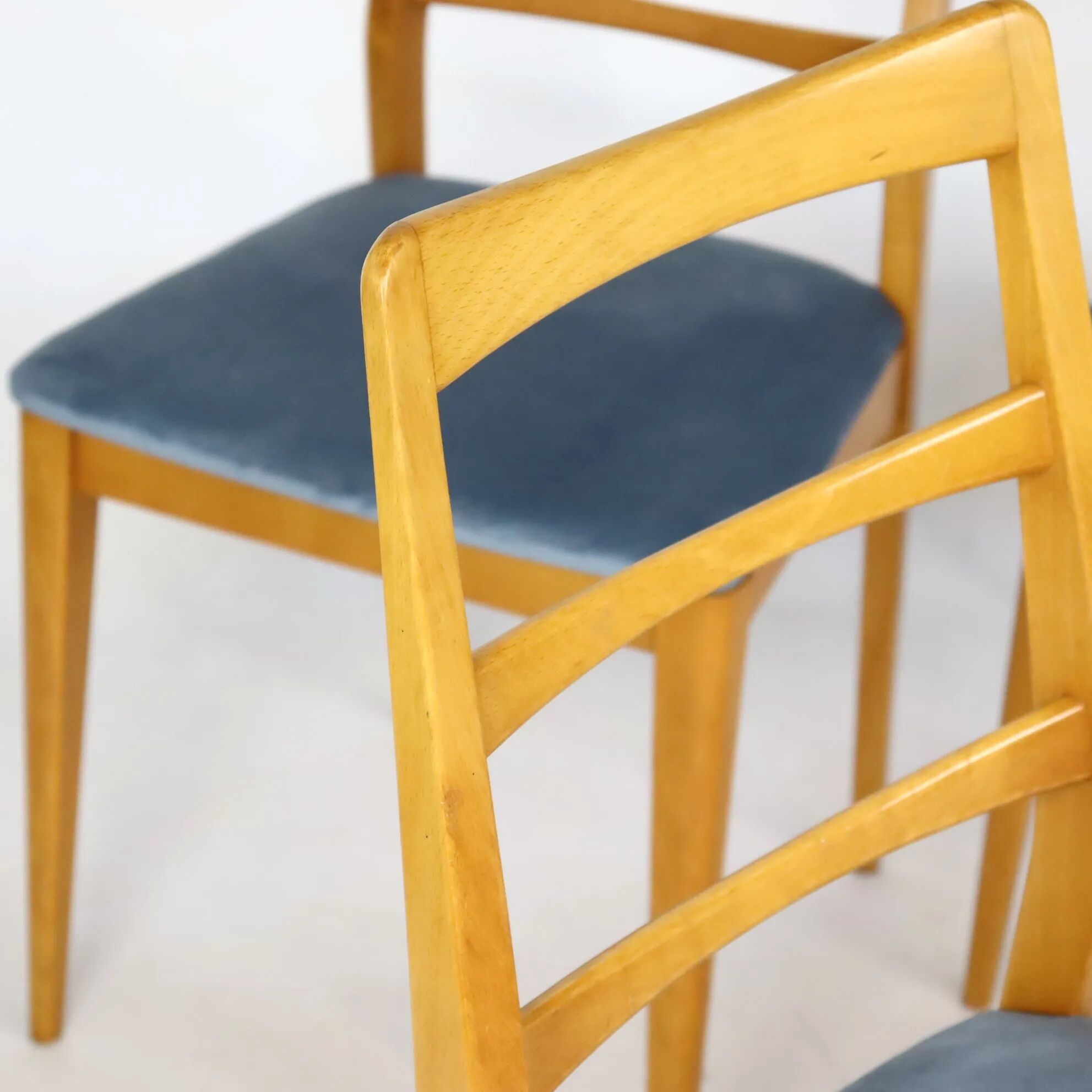Set of four blue velvet Scandinavian chairs.