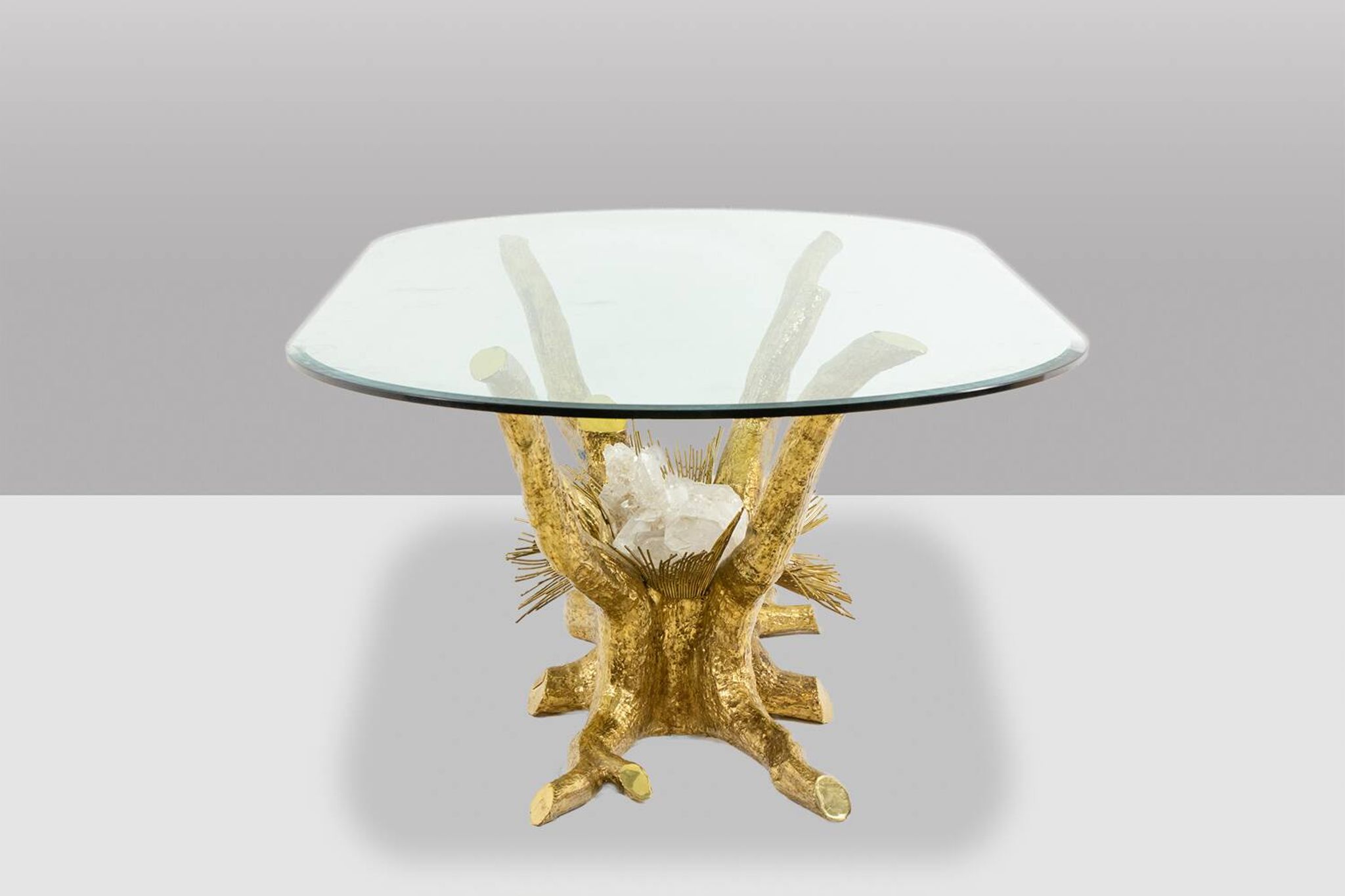 Pierre Duval Brasseur. Dining table in gilded brass. Circa 1970.