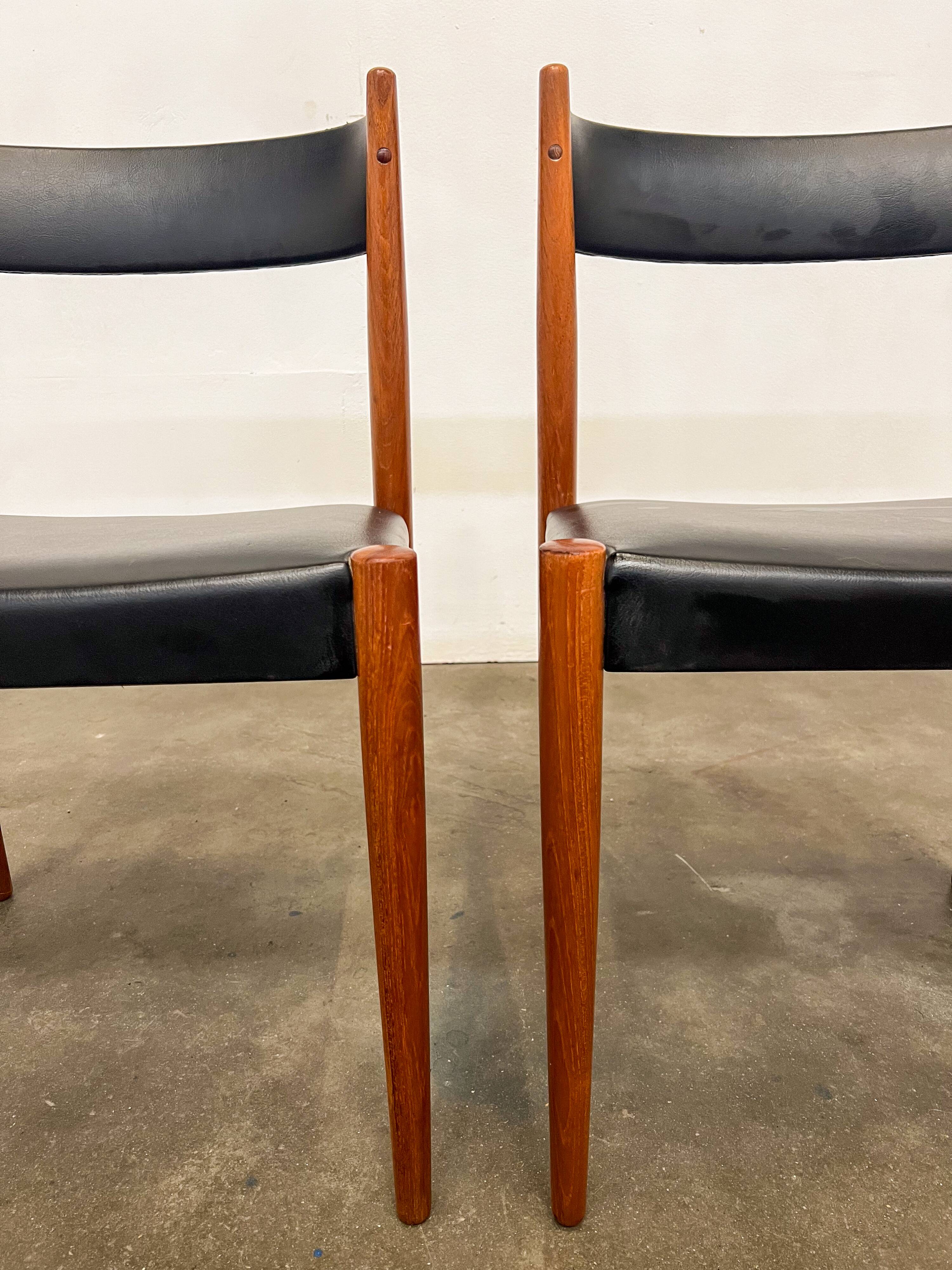 Set of 2 vintage chairs in wood and black faux leather – 1960s Scandinavian style