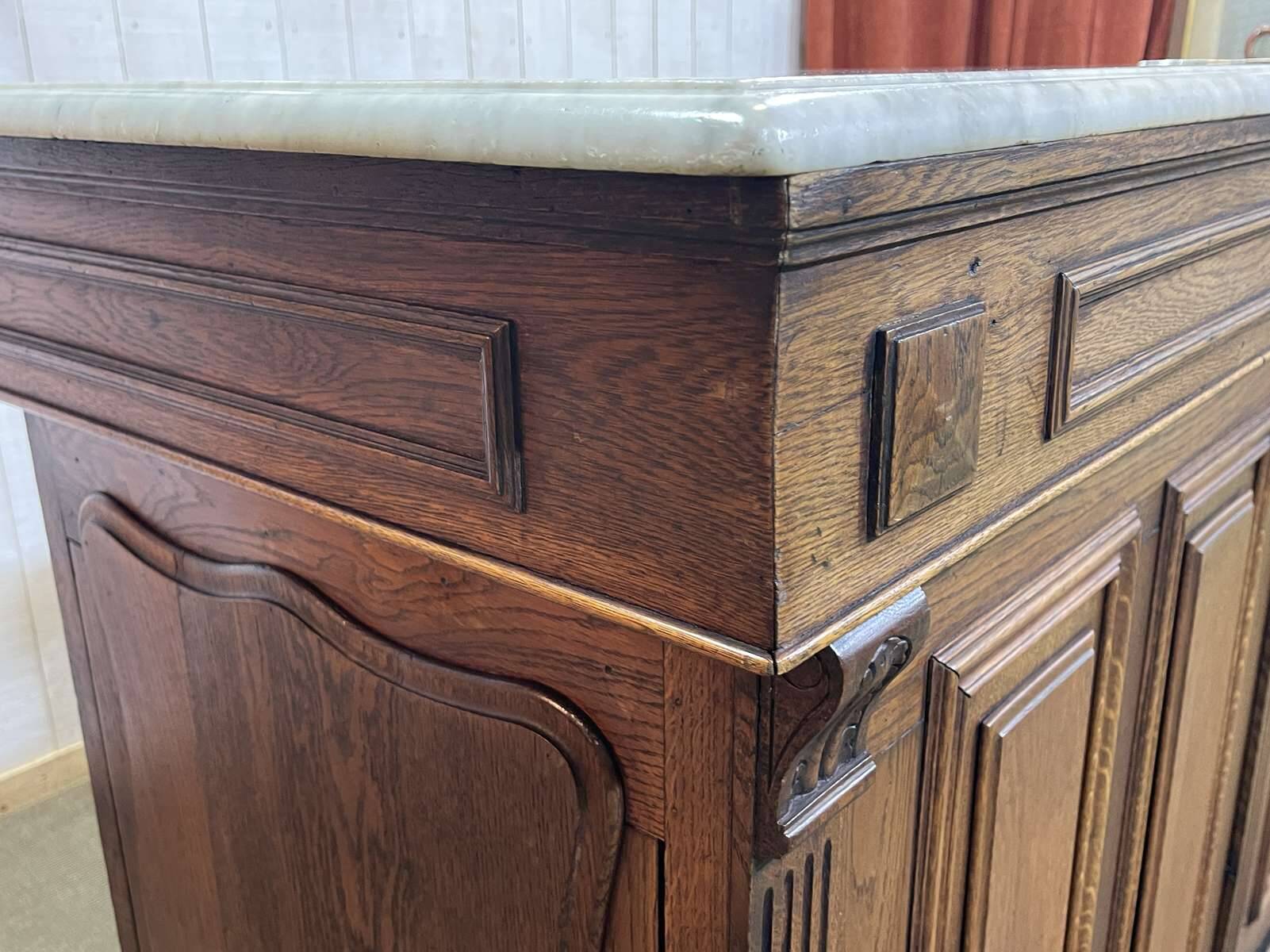 Bar counter in oak, zinc, and white marble from the early 20th century.