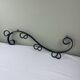 Wrought iron coat rack
