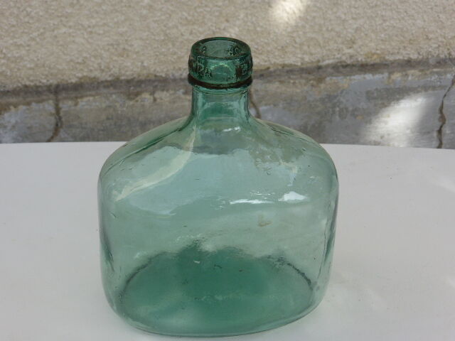 Charming bottle bottle brand BANDEIRA in vintage bluish green glass