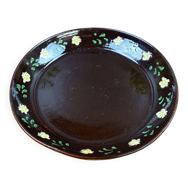 Ancien plat rond en poterie vernissée décor floral — Beyit