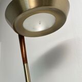 Golden metal floor lamp with reading light
