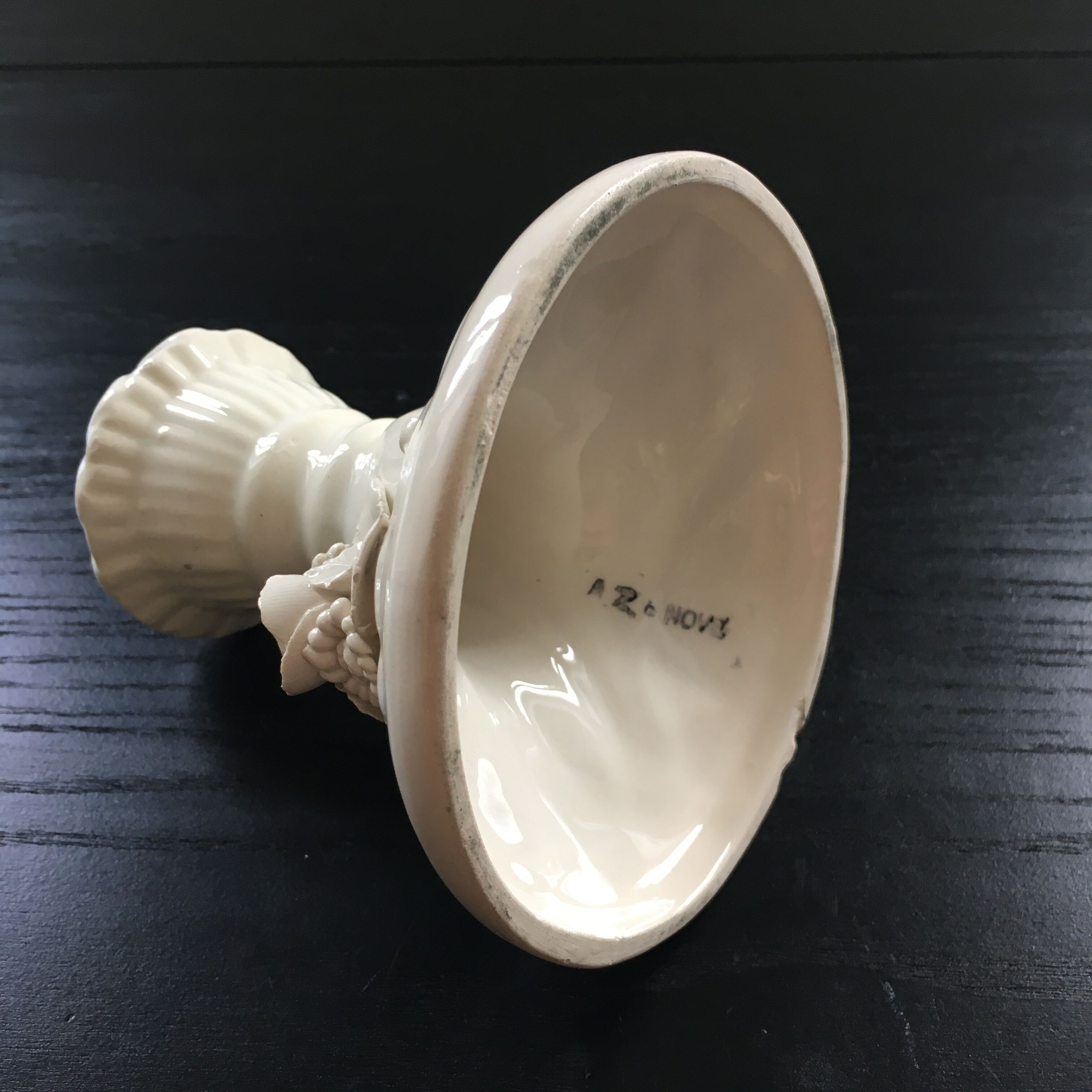 Ivory candle holder with barbotine decor