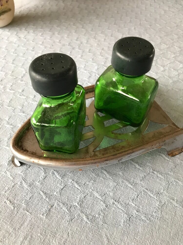 Salt/pepper green glass jars on metal base