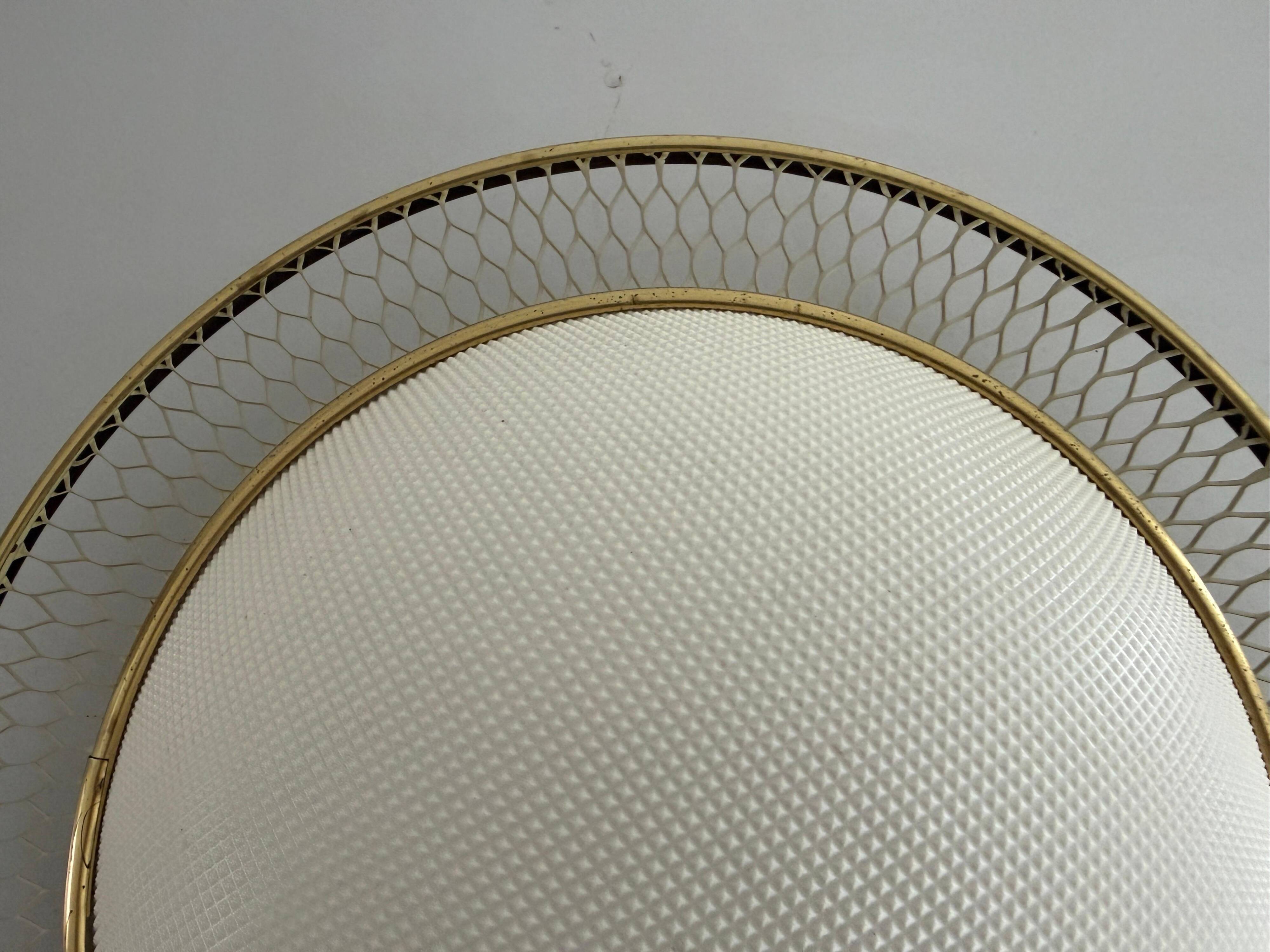 Mid-century golden metal wire and plastic ceiling light by Erco, 1950s, Germany.