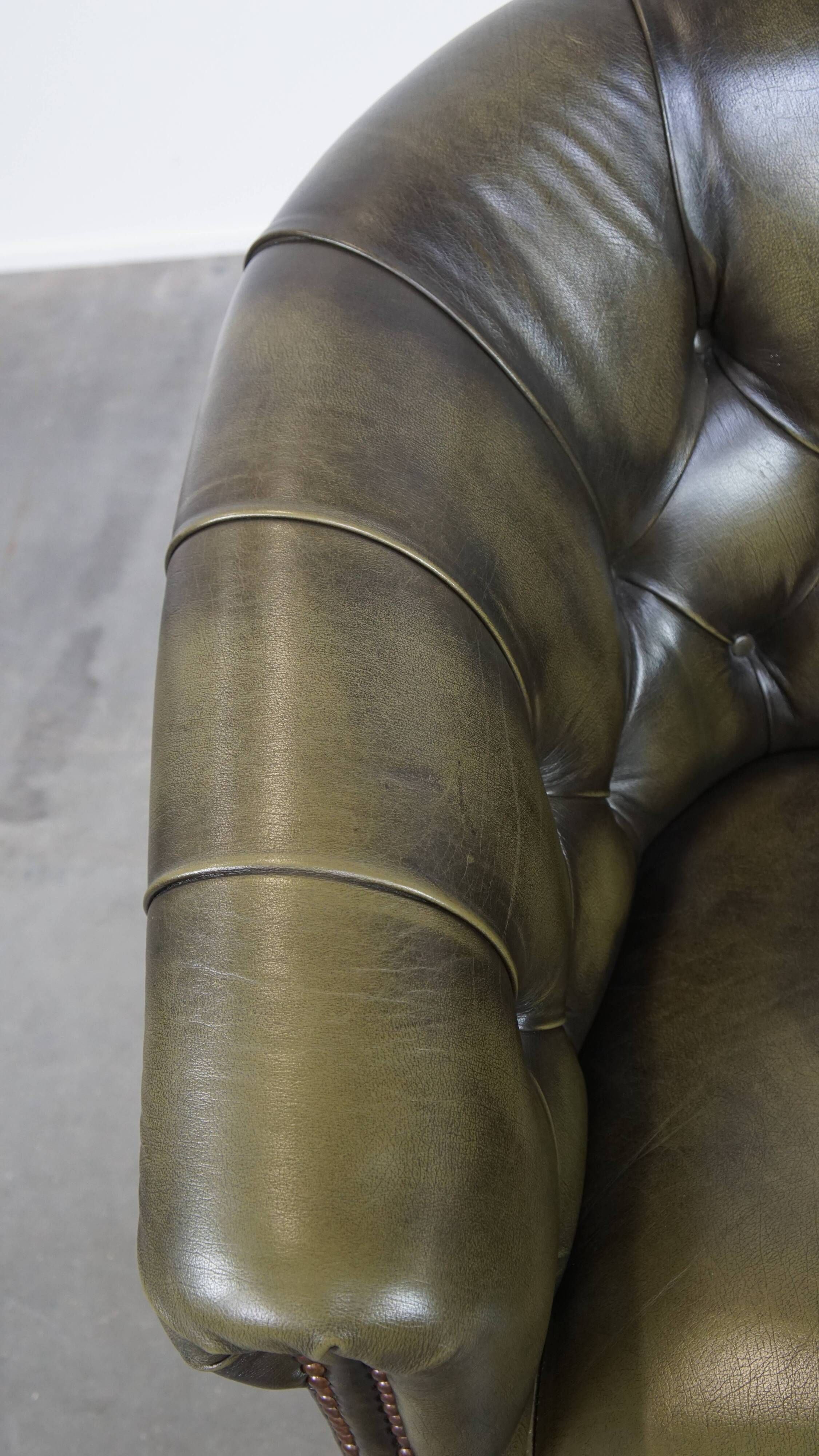 English Chesterfield club chair in olive green cowhide leather