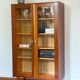 70s glass-fronted bookcase