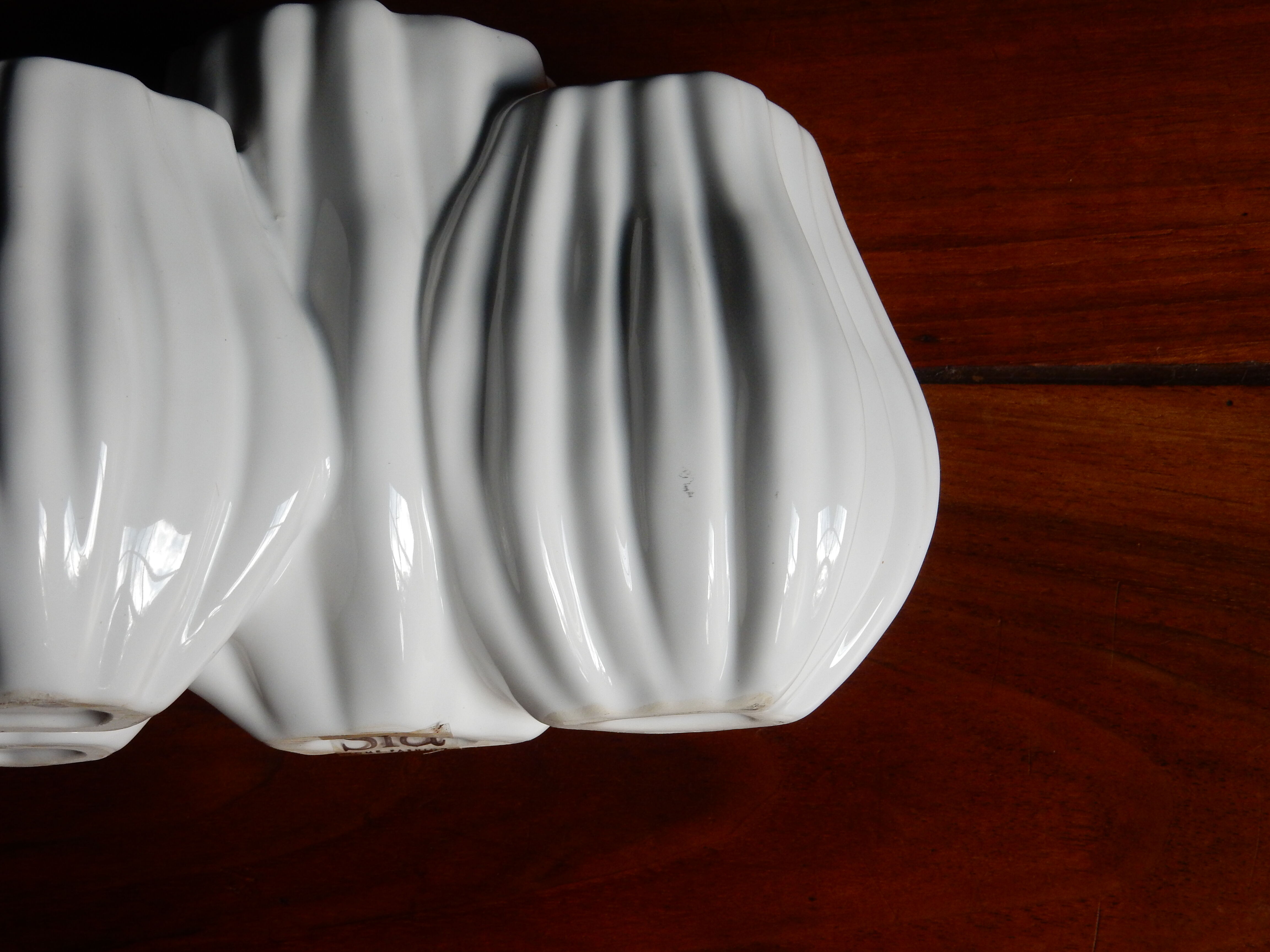 White ceramic vase design Sia