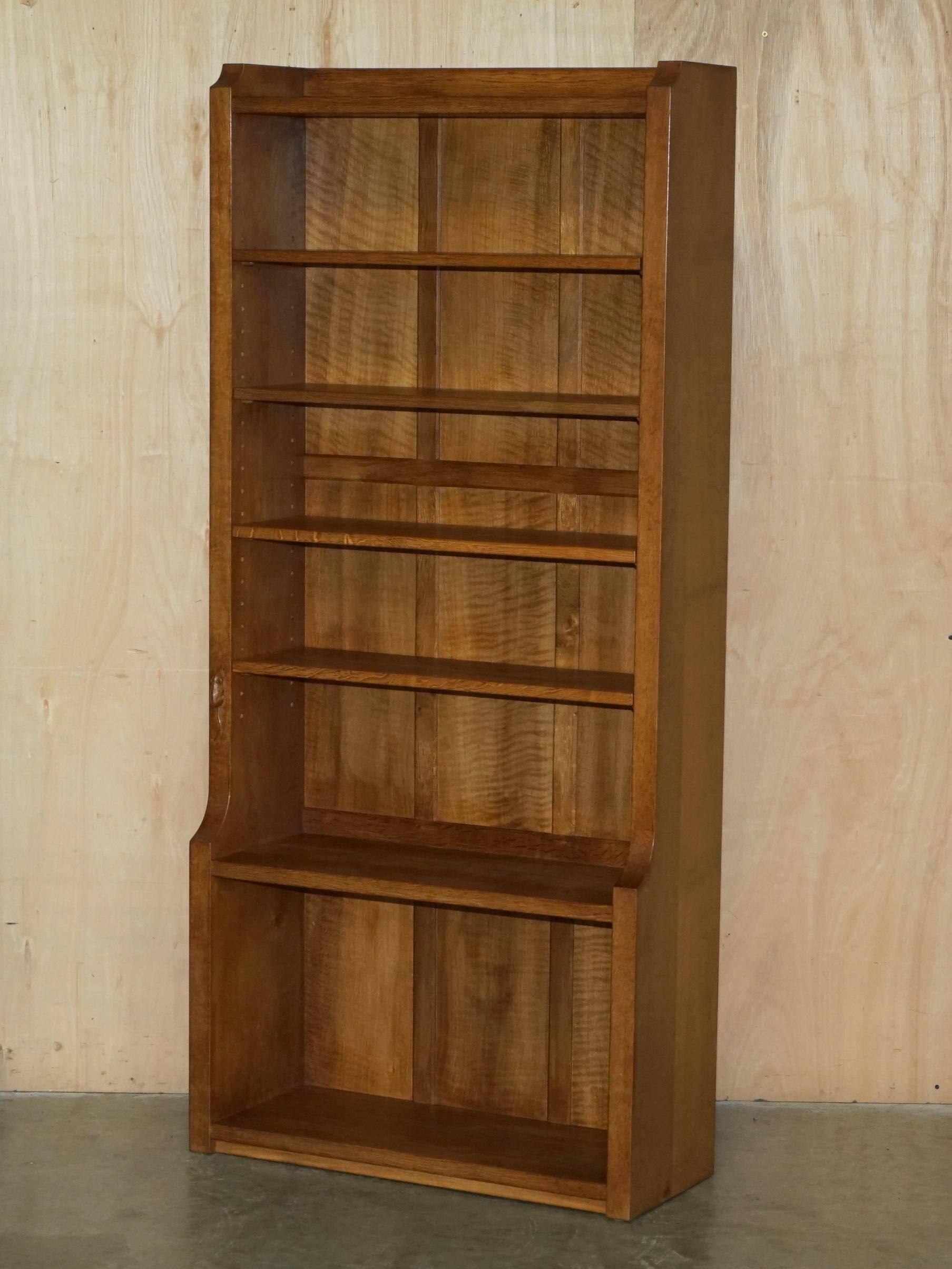 Pair of Robert Mouseman Thompson oak carved bookshelves.