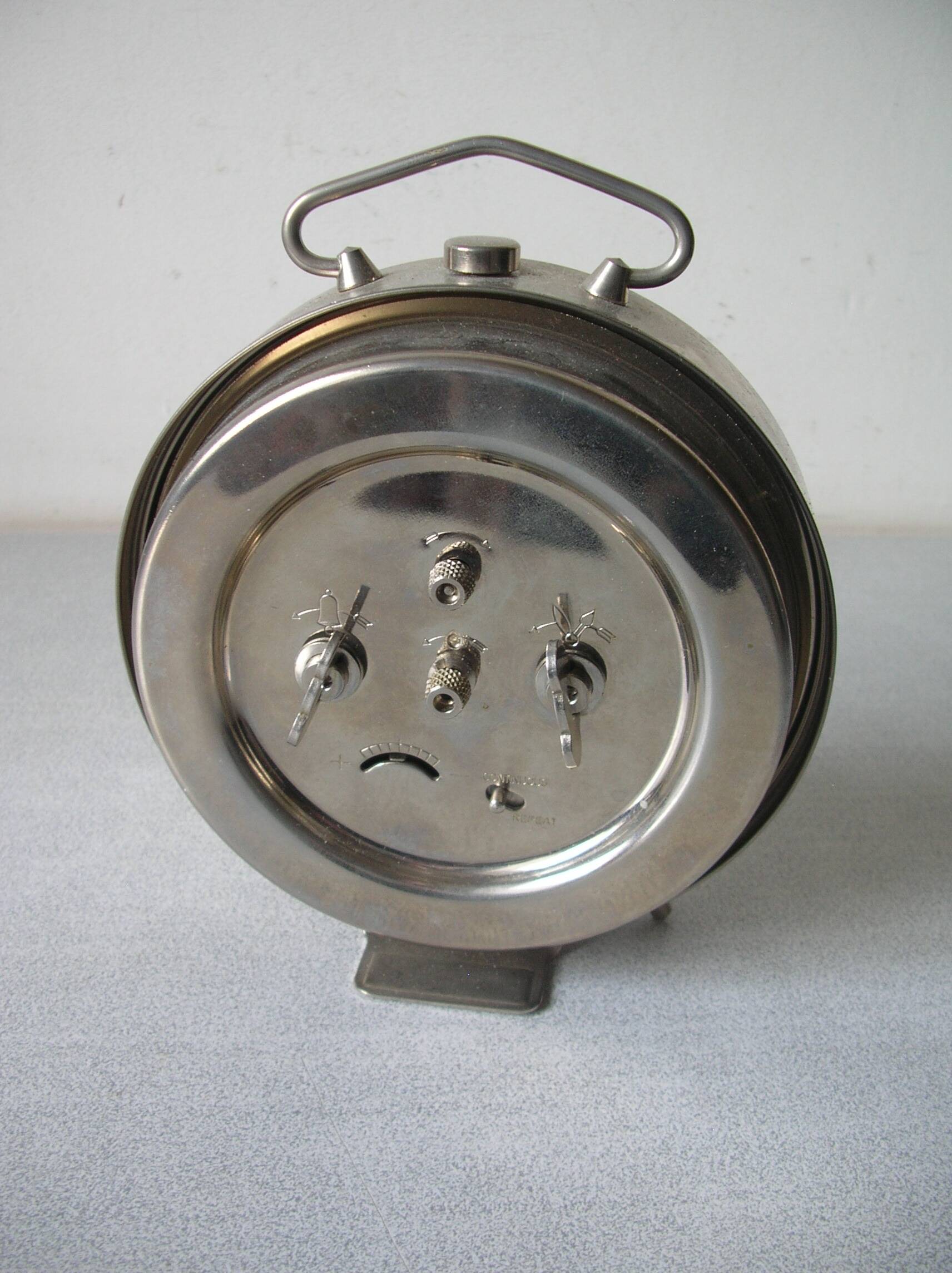 Old large mechanical alarm clock Peter Repeat Alarm chrome metal vintage retro decoration