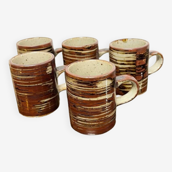 Set of 5 stoneware cups.