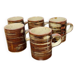 Set of 5 stoneware cups.