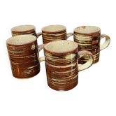 Lot de 5 tasses en grès.