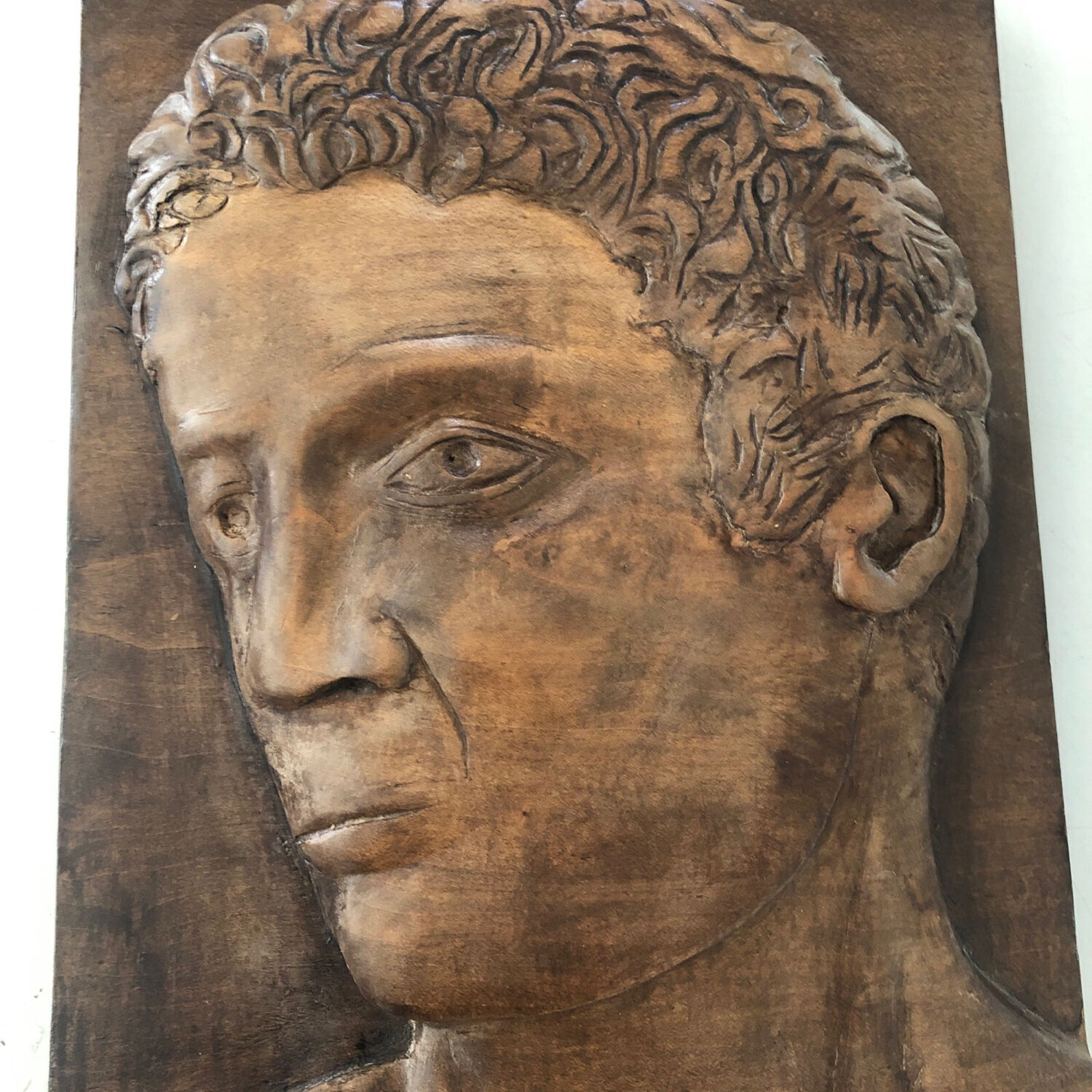 Wood carving profile man signed