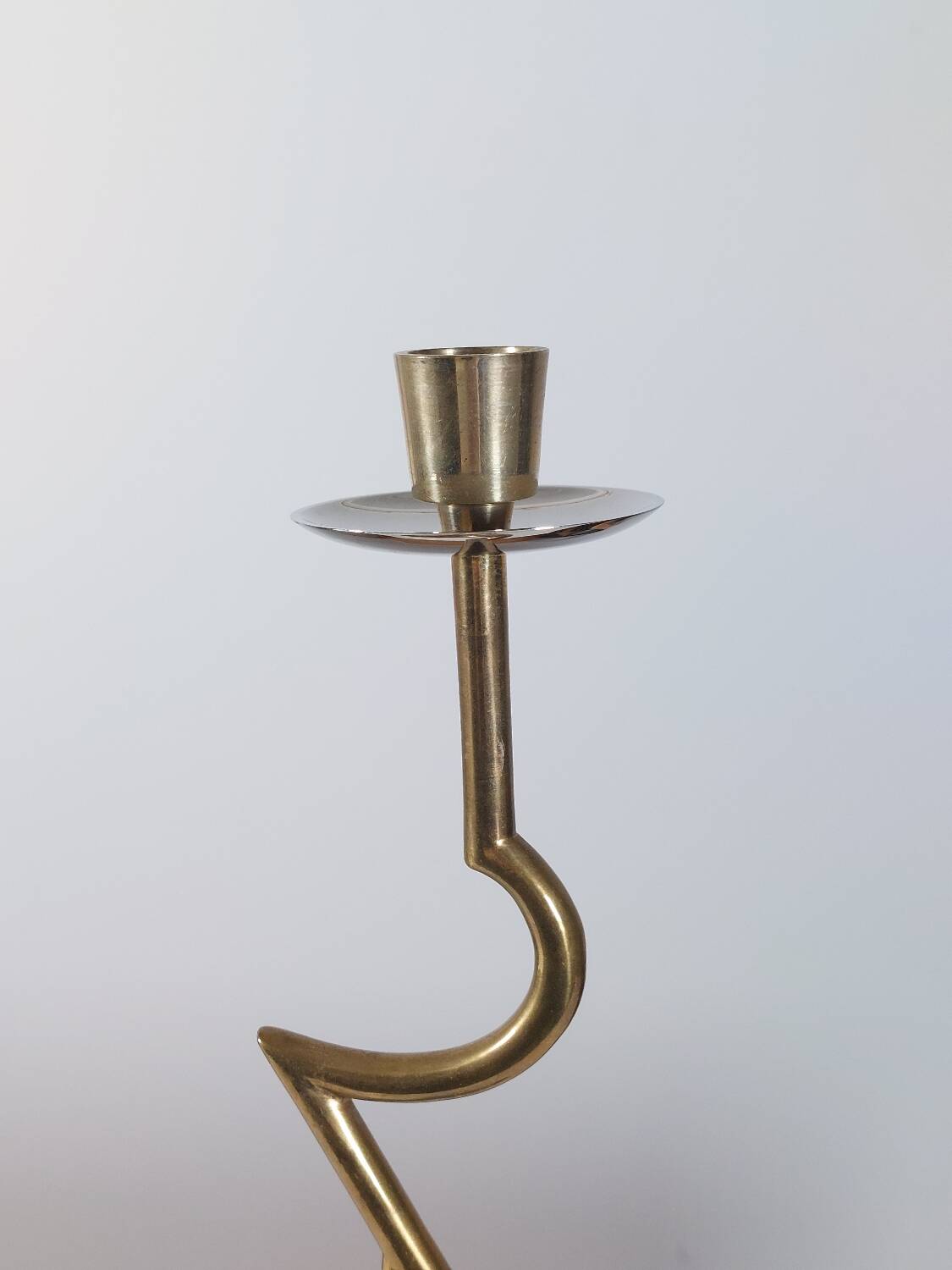 Vintage postmodern sculptural candlestick in chrome brass from the 1980s.