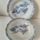 8 assiettes dépareillées en terre de fer bleue, 19ème