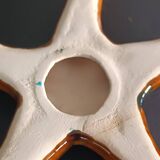 Two vintage ceramic wall pots featuring a seahorse and a starfish.