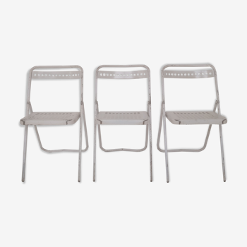 Trio of white Souvignet “plichaise” metal chairs