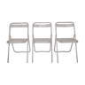 Trio of white Souvignet “plichaise” metal chairs