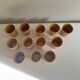 Set of 12 ochre Chavaillon de Sarreguemines cups