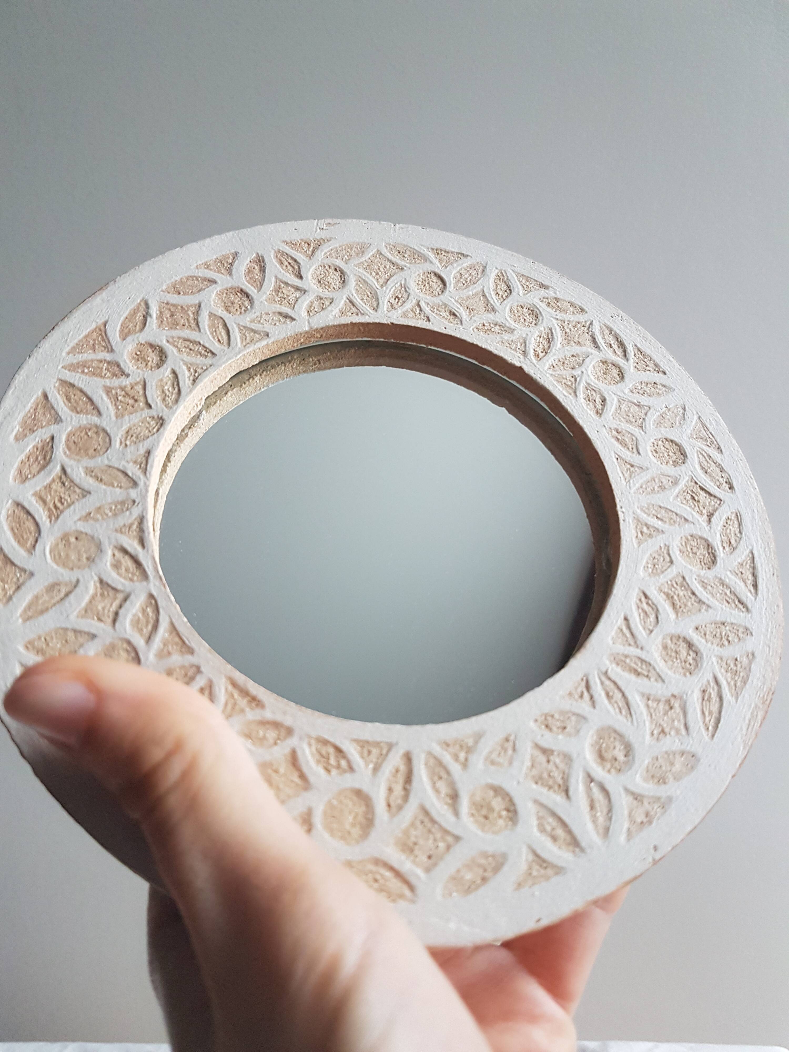 Stoneware mirror with sgraffito decoration