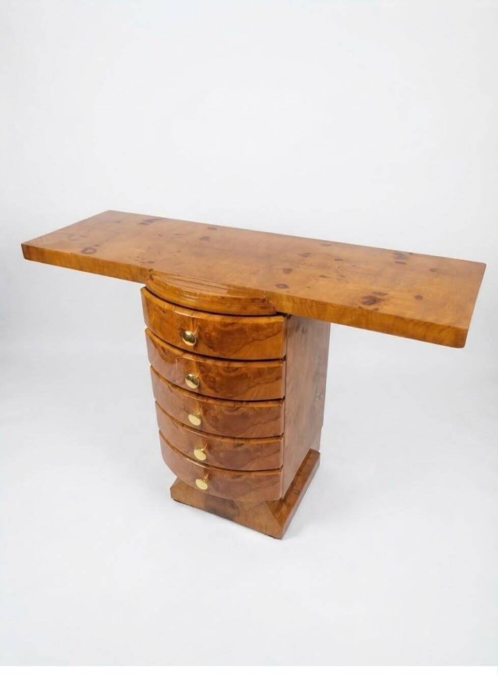 An Art Deco console made of beech wood with elm burl and 5 drawers.