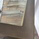 Table basse vintage en laiton et verre biseauté