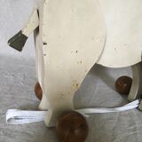 Wooden elephant on wheels