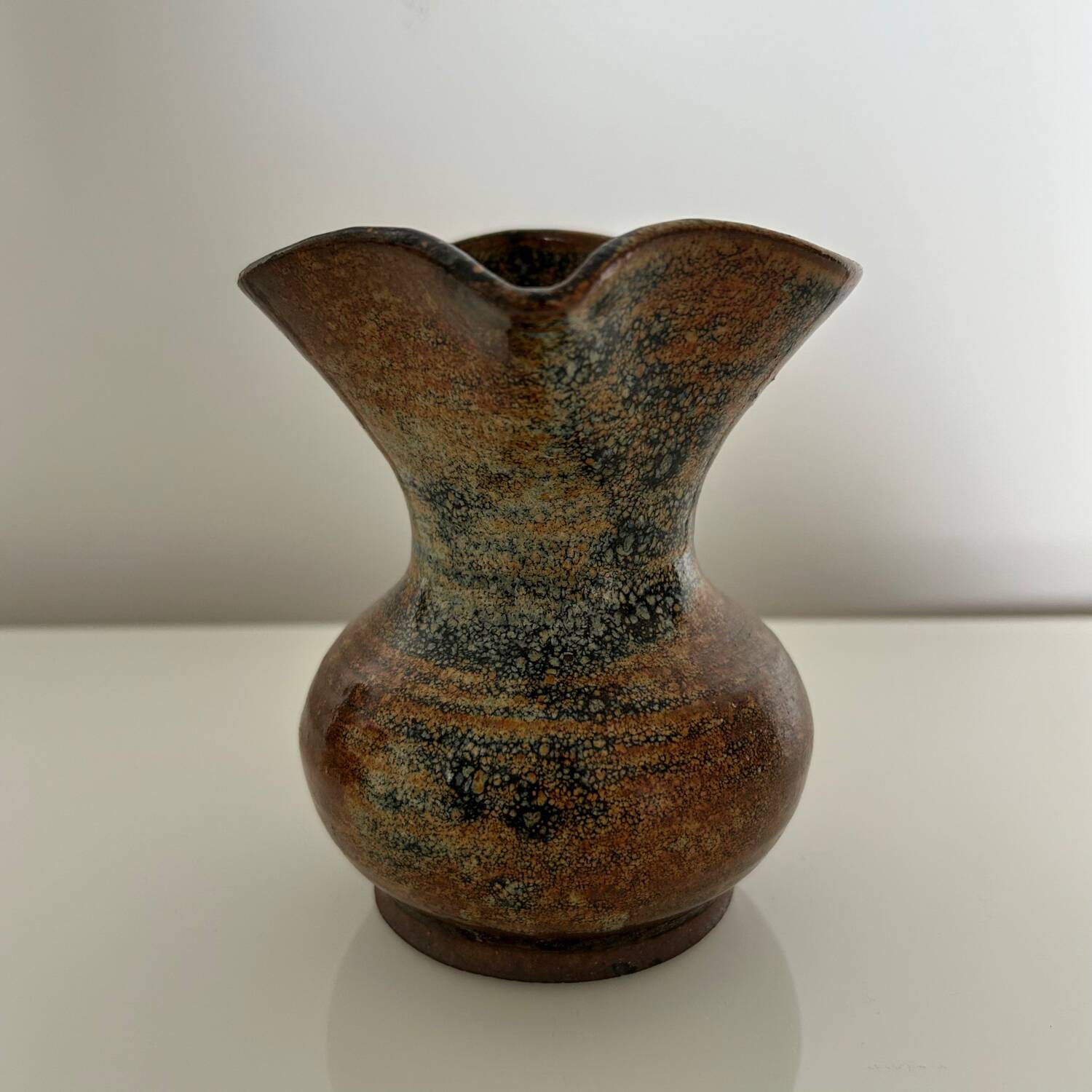 Patinated stoneware jug