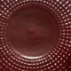 Burgundy and gold openwork plate in ceramic from Saint-Clement, 1950s.