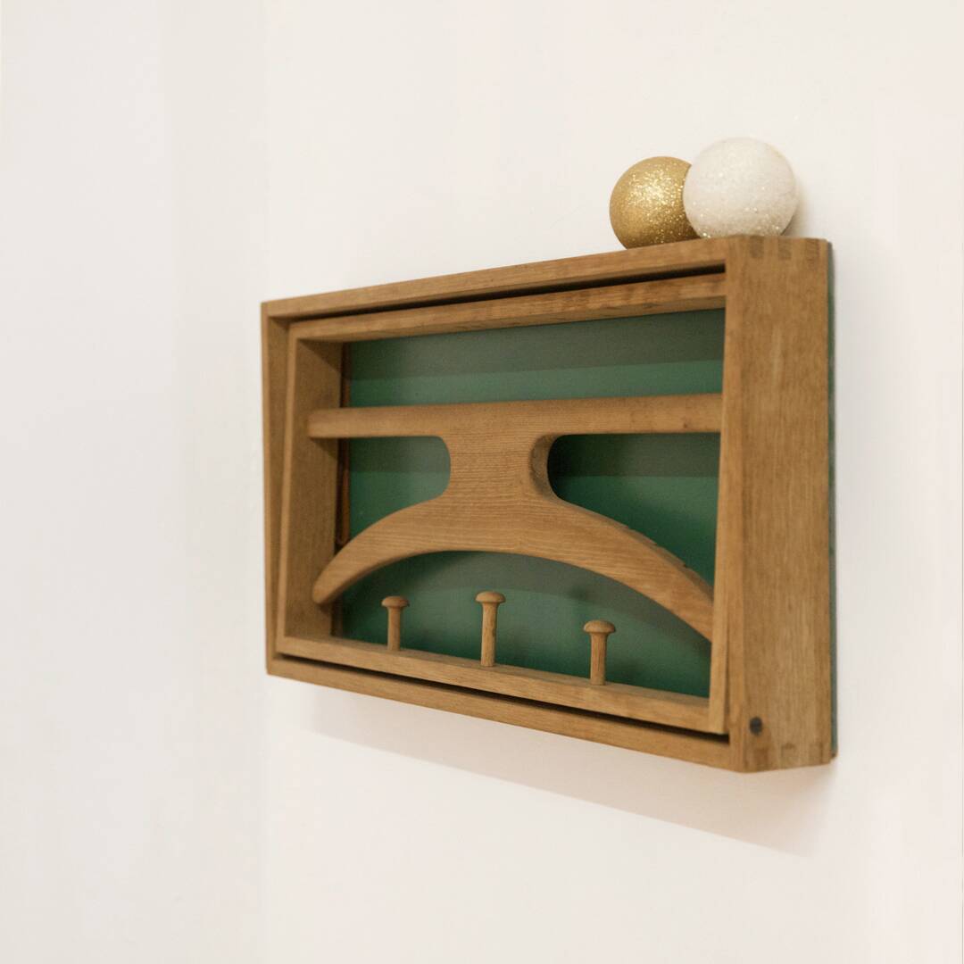 Valet coat rack designed by Adam Hoff (born 1932) and Poul Østergaard (born 1933).