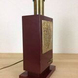 1980s vintage lamp base in red wood and gold metal.