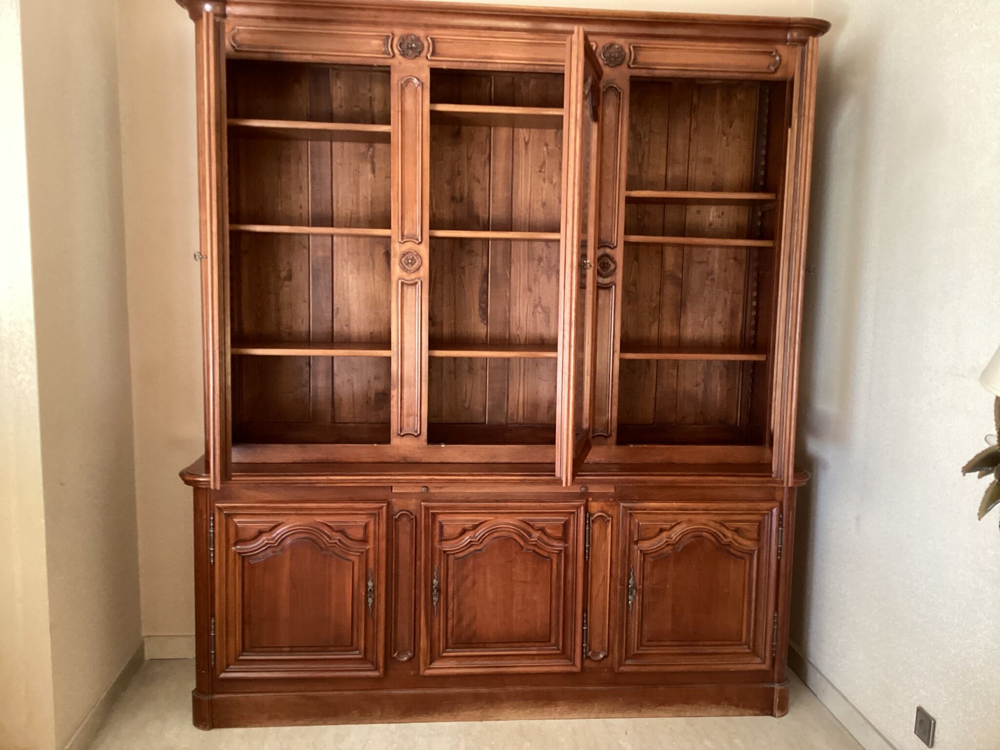 Cherry bookcase stamped Louis Tricoire