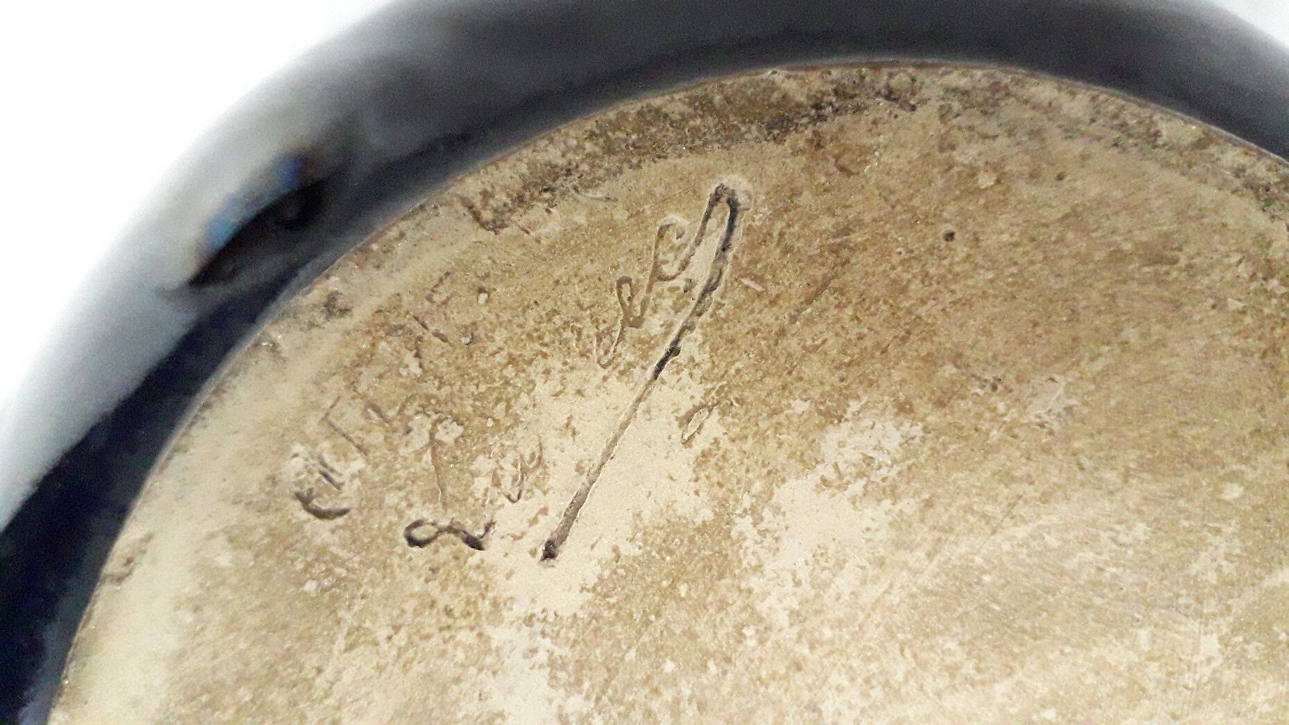 Signed stoneware vase