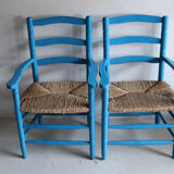 Pair of Provençal armchairs in painted wood and straw, around 1960.