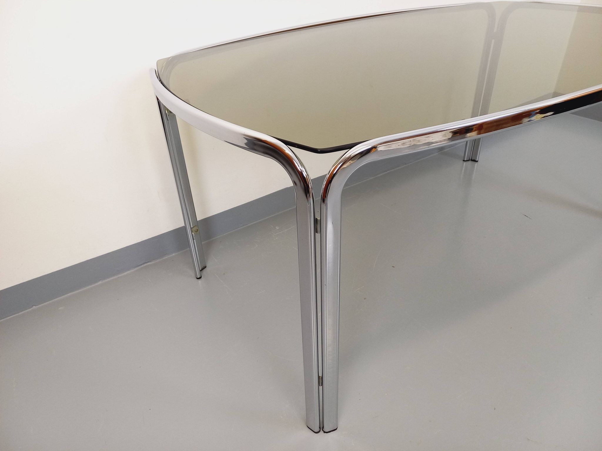 Vintage curved rectangular dining table in smoked glass and chrome metal