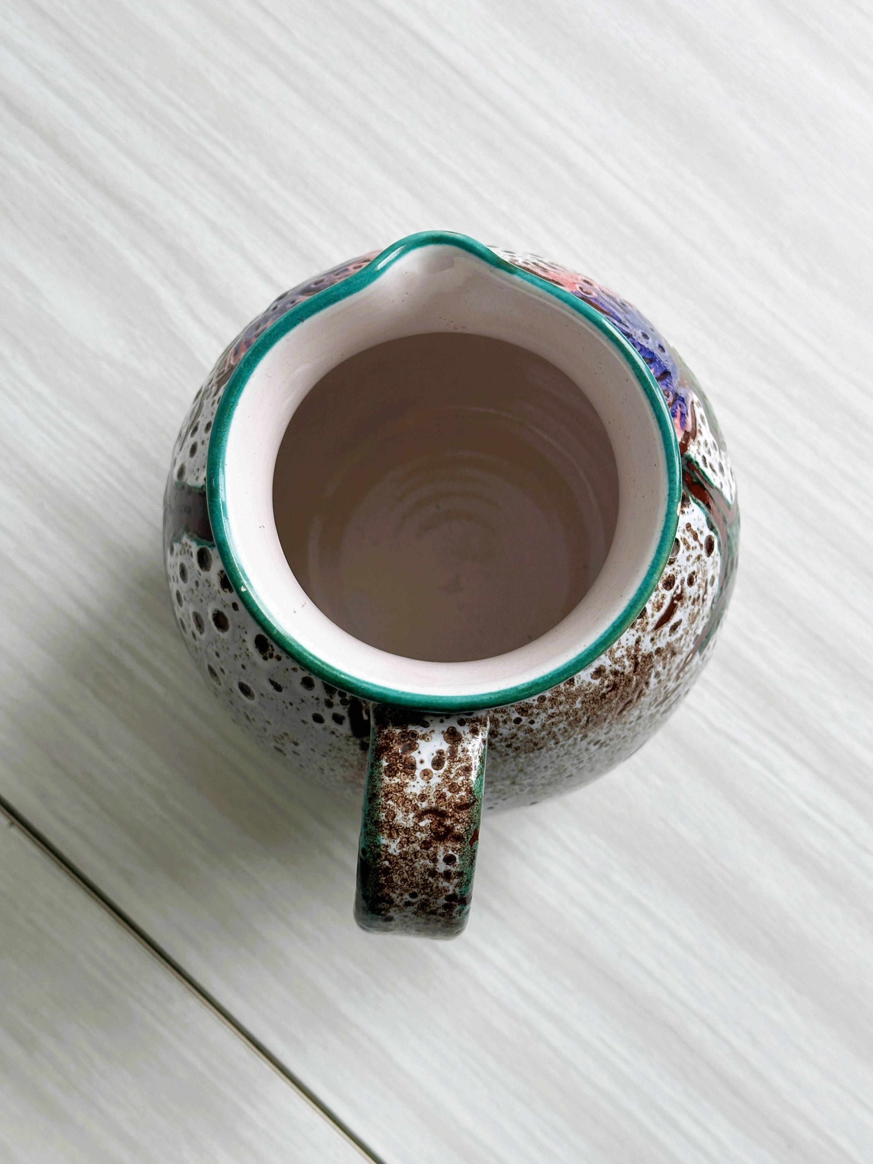 Antique decorative pitcher in French ceramic