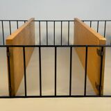 Floating wall shelf in oak veneer and black metal, 1960s.