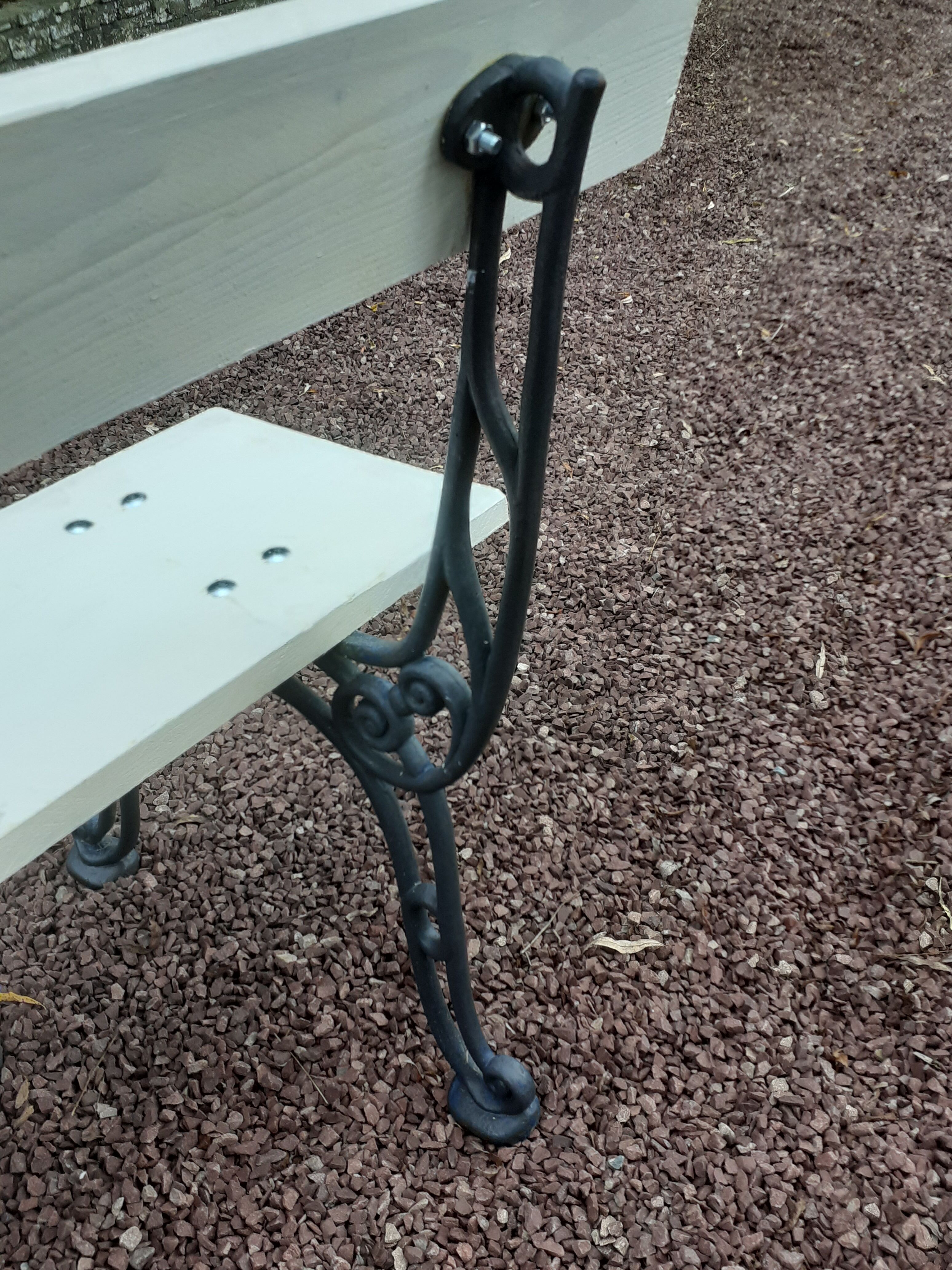 Garden bench with old cast-cast-or-cast-or-cast foot