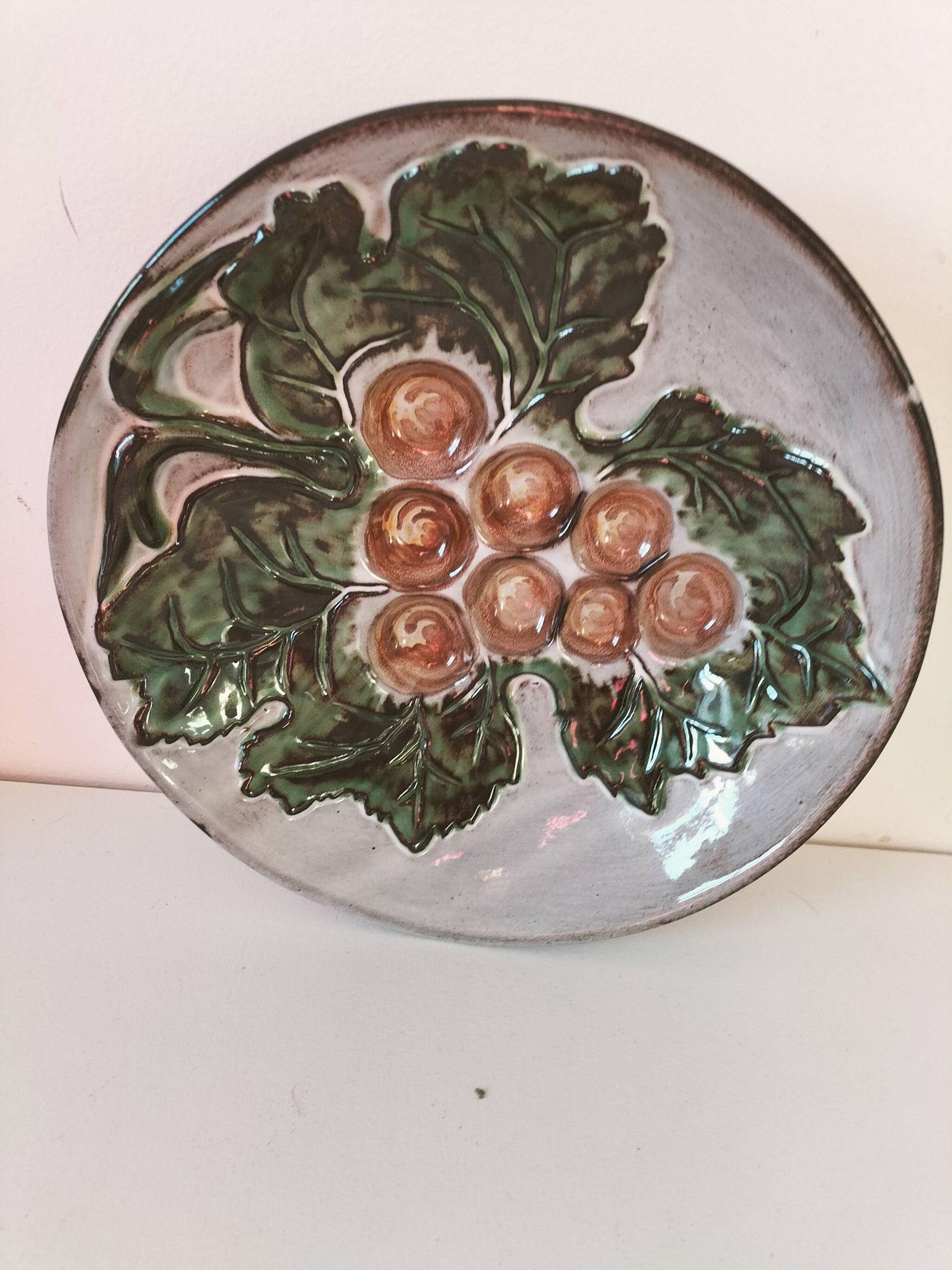 Vintage ceramic bowl – embossed grape pattern in slip style