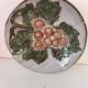 Vintage ceramic bowl – embossed grape pattern in slip style